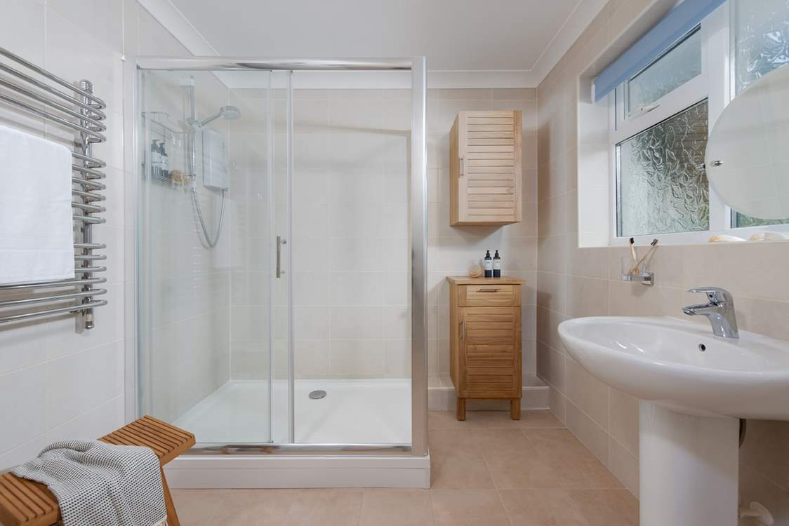 The family shower-room has a large shower, perfect for a refreshing shower after a busy beach day.