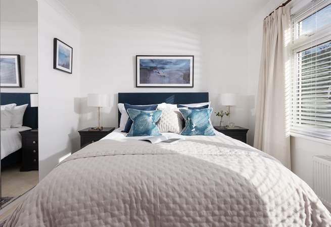 A great night's sleep is assured in bedroom 1 with a super comfy king-size bed and luxury linens.