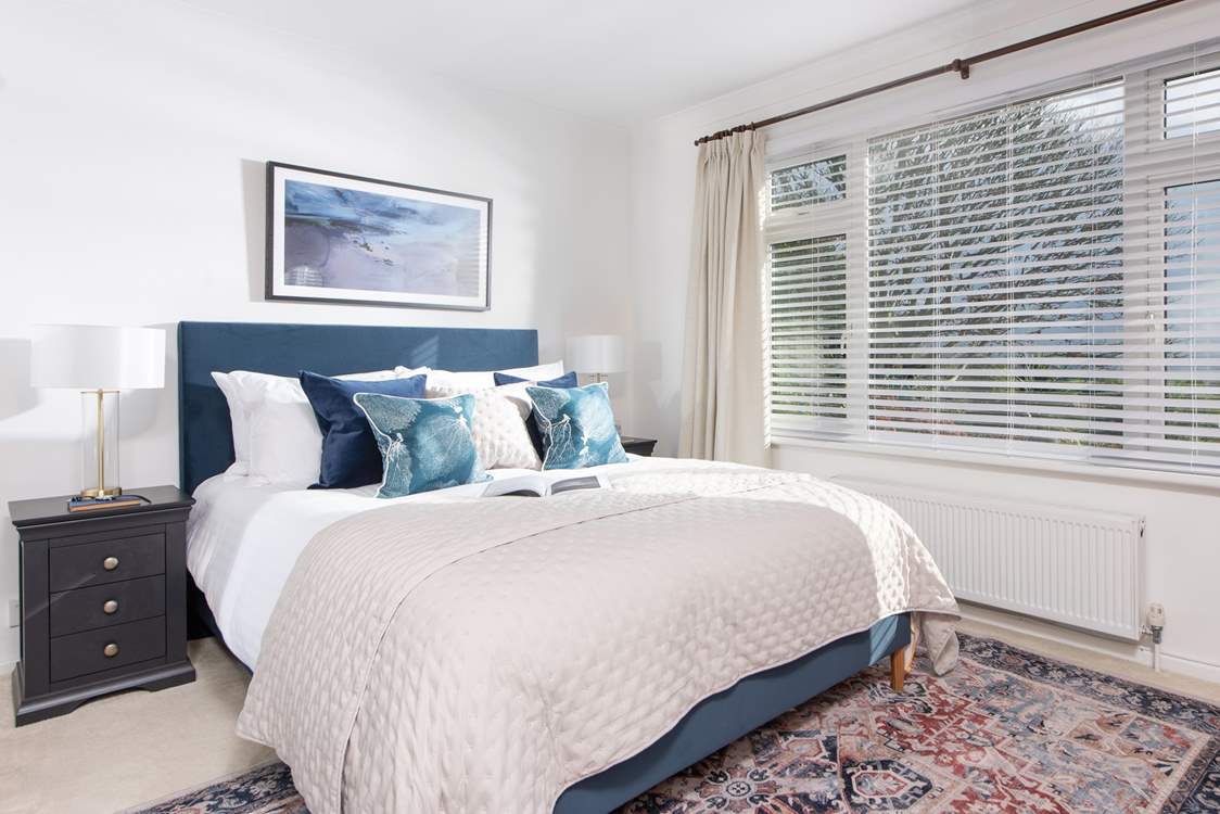 The delightful bedrooms are beautifully furnished.
