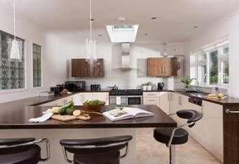 The gorgeous kitchen has been cleverly designed for optimum socialising.