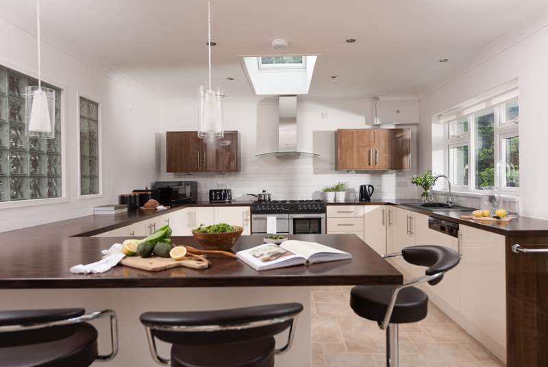 The gorgeous kitchen has been cleverly designed for optimum socialising.
