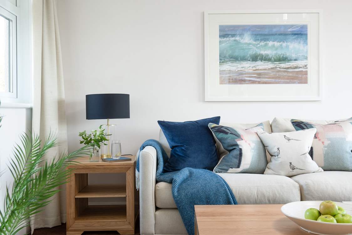 Stylish soft furnishings invite you to relax.
