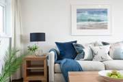 Stylish soft furnishings invite you to relax.