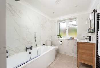 Bedroom 1 has a luxury modern en suite bathroom.