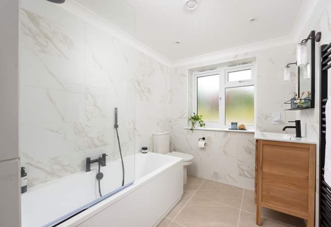 Bedroom 1 has a luxury modern en suite bathroom.