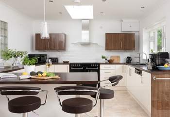 The gorgeous kitchen has been cleverly designed for optimum socialising.