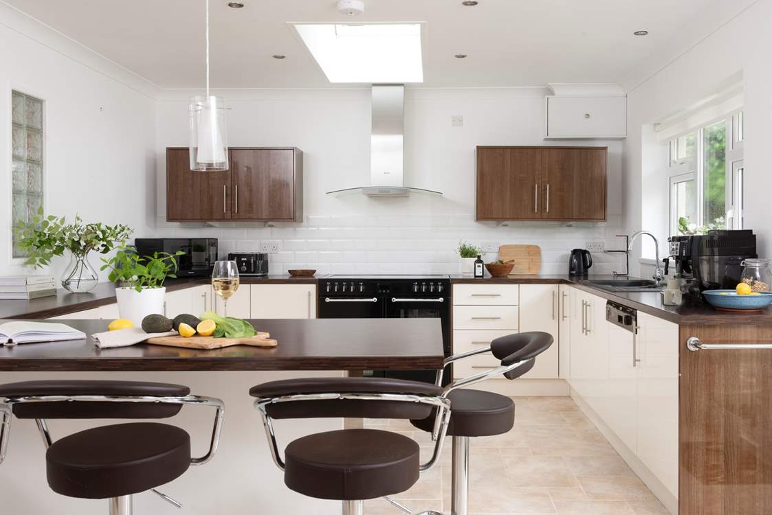 The gorgeous kitchen has been cleverly designed for optimum socialising.