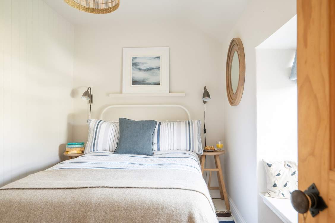 Bedroom 2 is a cosy room with a small four-foot double bed (please note this is 6