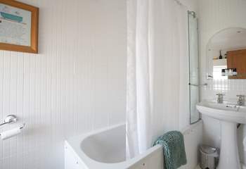 The family bathroom with fitted shower (hiding behind the curtain)