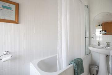 The family bathroom with fitted shower (hiding behind the curtain)