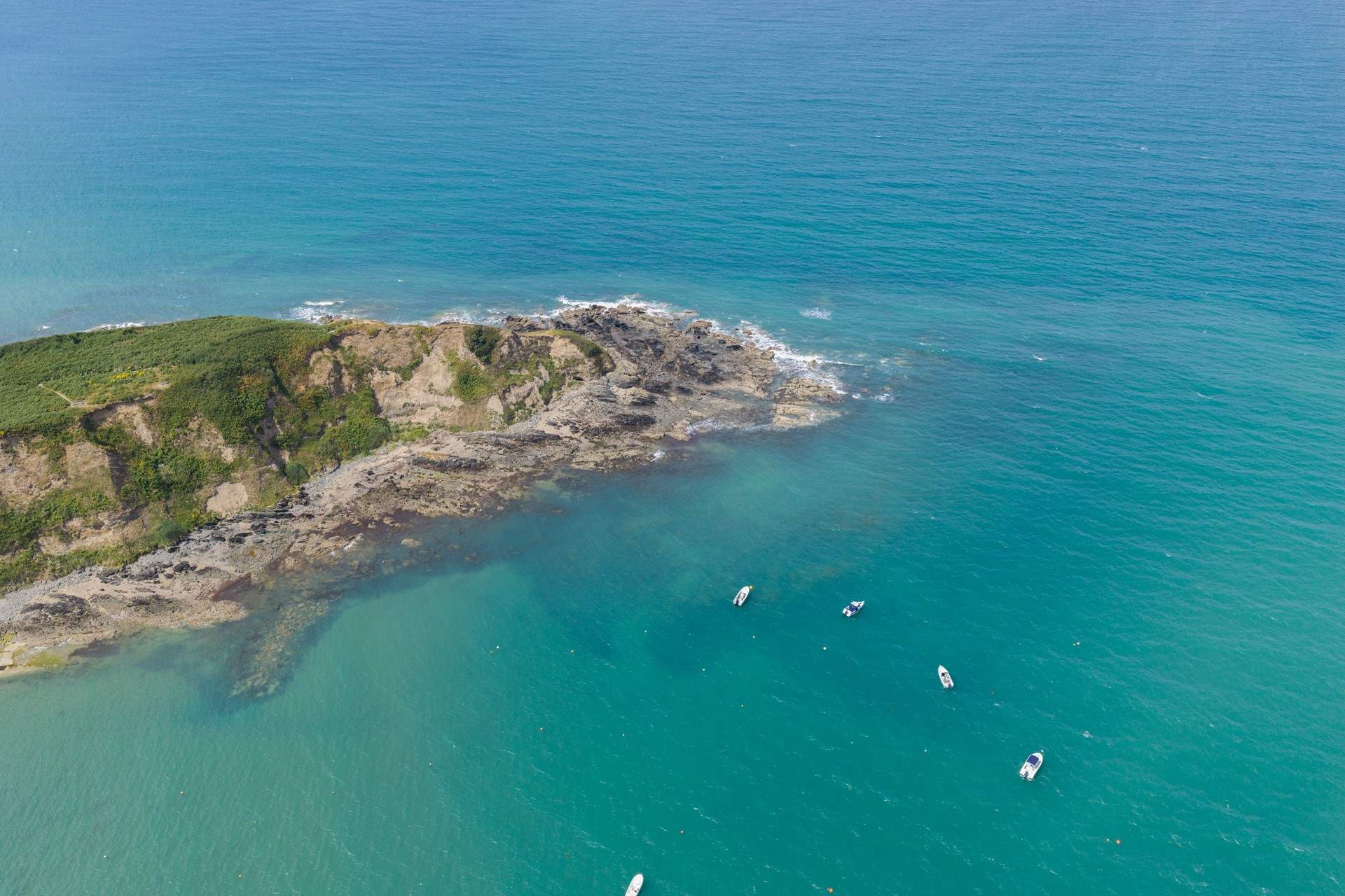 Pack a picnic and swim in the crystal clear sea. 