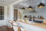 The chic kitchen is perfect for sociable dining.