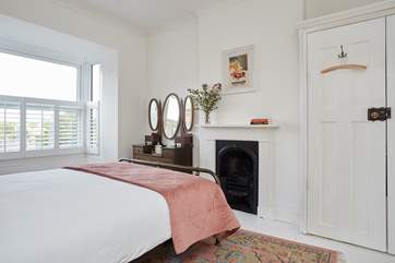 Delightful bedroom 1 has a comfy king-size bed and lovely furnishings.
