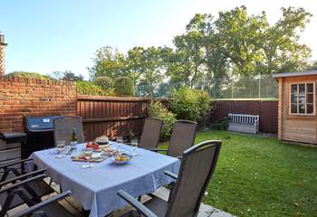 The Drey has a private back garden which overlooks the tennis court.