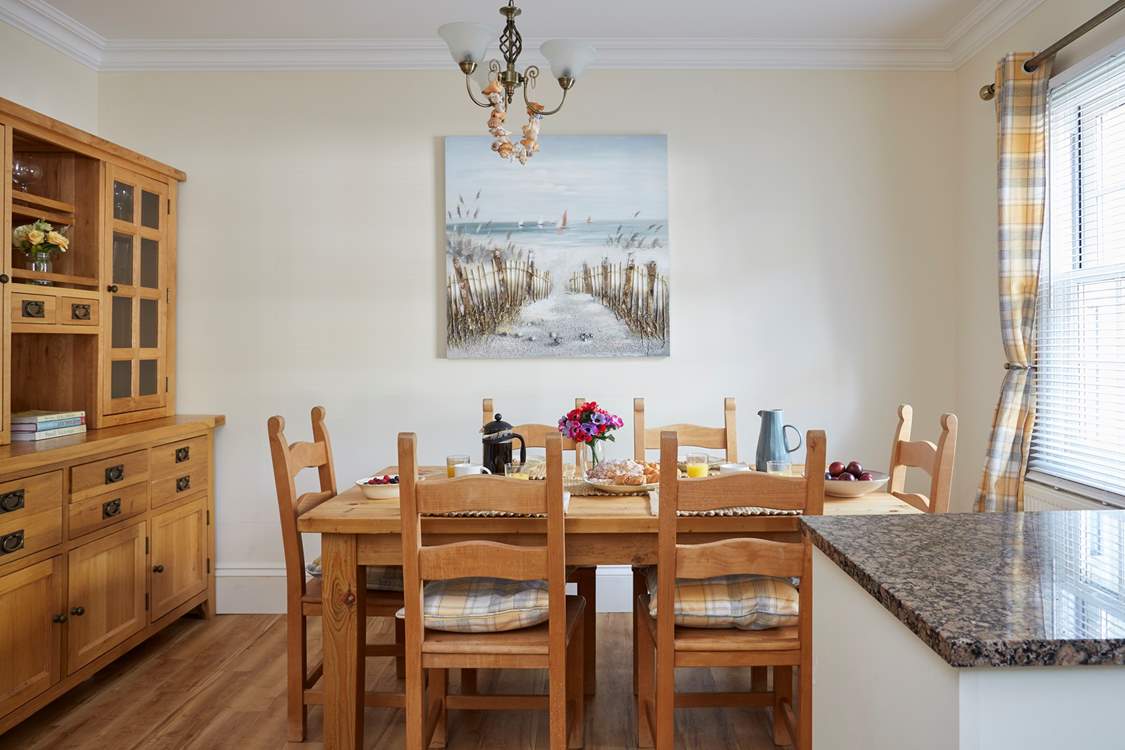Gather everyone around the dining-table to plan the day's adventures.