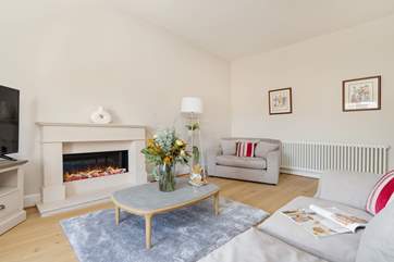 The fabulous electric fire will keep you toasty warm throughout the seasons.