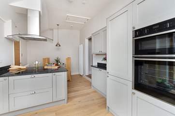 Sleek and contemporary, whipping up holiday feasts in the kitchen will be a pleasure.