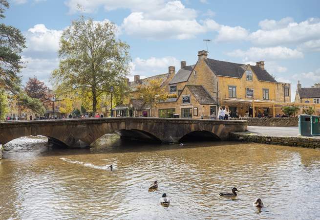 Head to Bourton-on-the-Water, a short drive away and wander along the pretty river bank. 