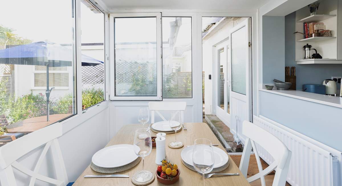 The dining space is a lovely, light filled room.