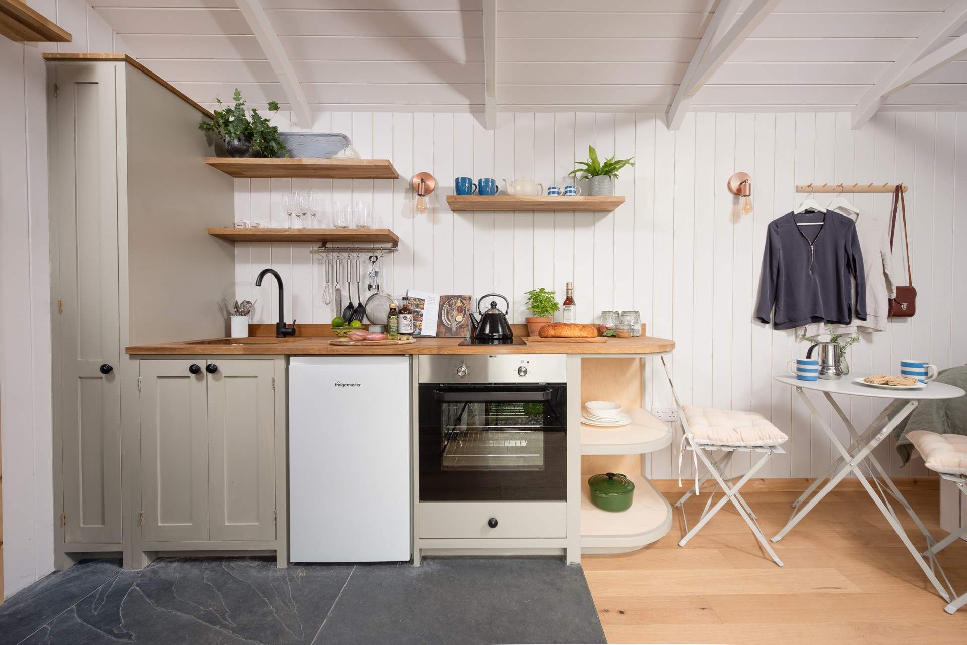 The country style kitchen is perfectly equipped for two.