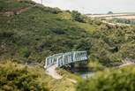 Get on your bike and head off along the Camel Trail leading to Bodmin Moor in one direction and out to Padstow on the coast in the other.