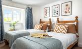 Rustic twin beds in bedroom 9. - Thumbnail Image