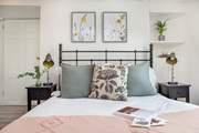 Lovely linens, plump cushions and snuggly throws dress the beds.