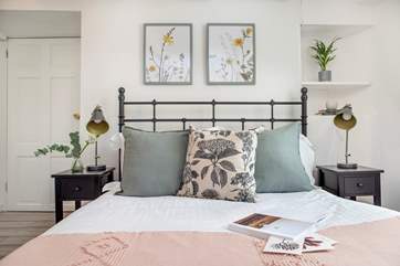 Lovely linens and plump cushions and snuggly throws dress the beds.