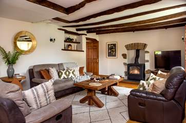 One sitting-room has a toasty wood-burner making this a perfect retreat whatever the weather.