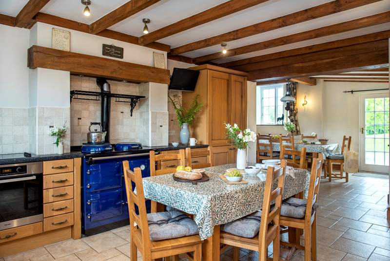 The kitchen/breakfast-room has a warming range cooker - the epitome of country living.