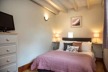 Pretty bedroom one has an en suite cloakroom.