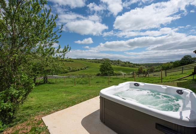 The second hot tub enjoys wonderful views across the open countryside.