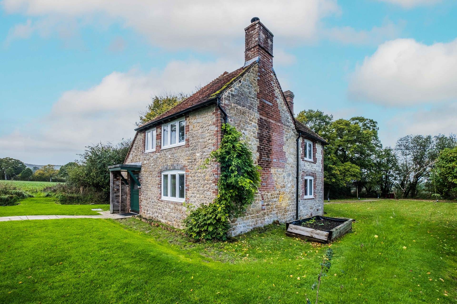 This charming cottage awaits your arrival.