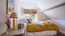 Pretty bedroom 1 has a comfy single bed.