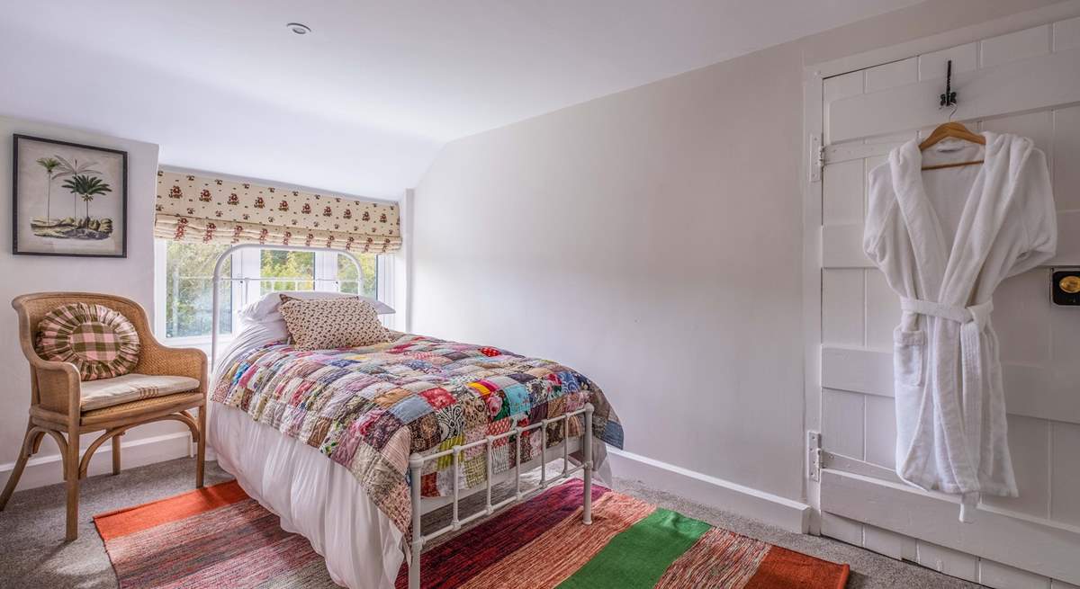 There are two quaint single bedrooms, perfect for either adults or children.