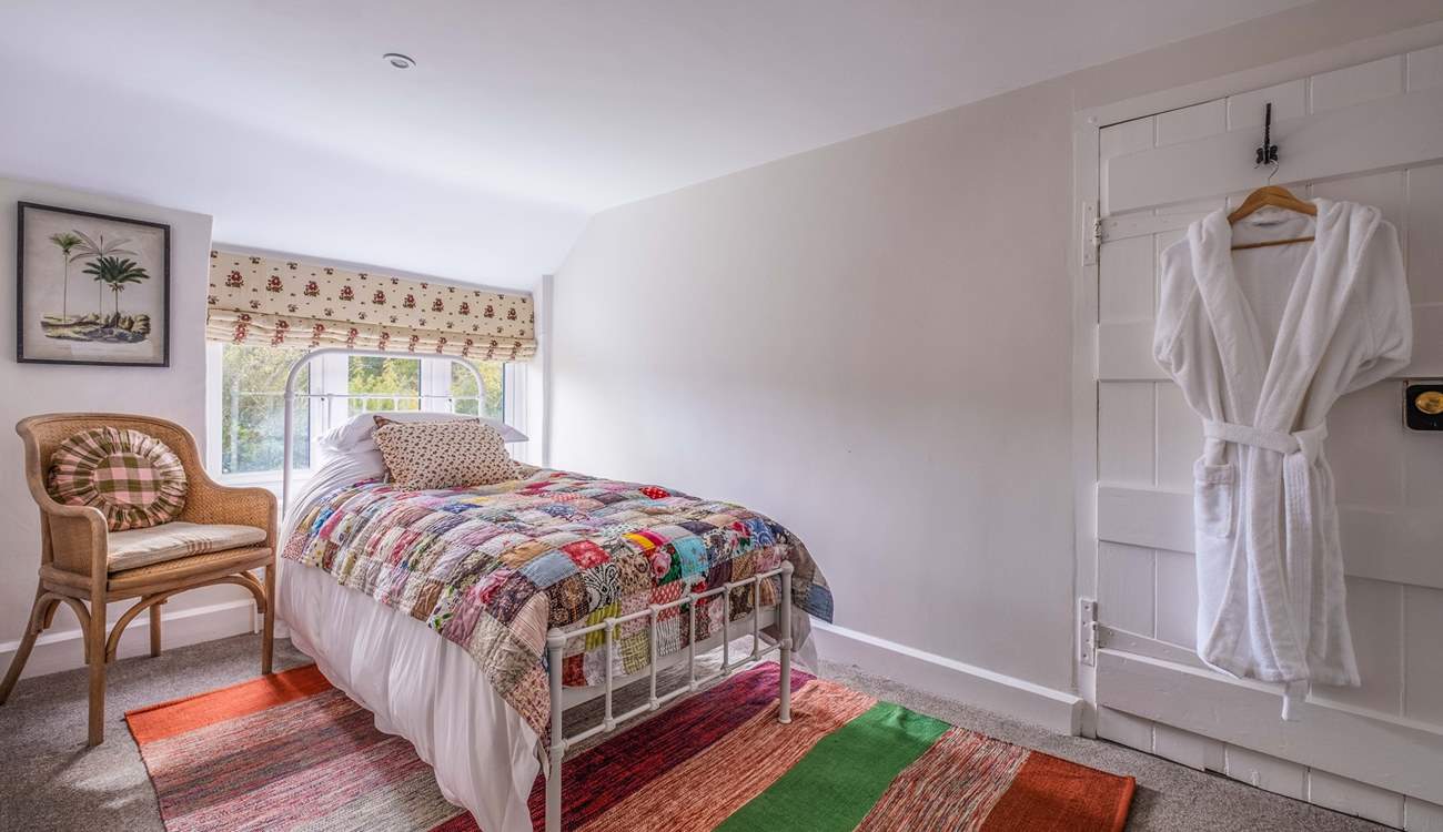 There are two quaint single bedrooms, perfect for either adults or children.