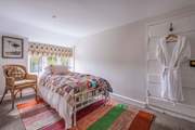 There are two quaint single bedrooms, perfect for either adults or children.