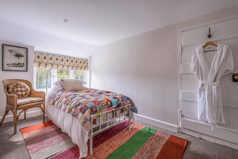 There are two quaint single bedrooms, perfect for either adults or children.
