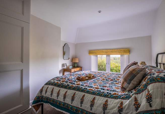 Bedroom 2 has a comfy king-size bed.