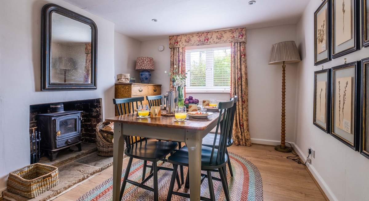 The dining-room has a wood-burner to keep you cosy in cooler months.