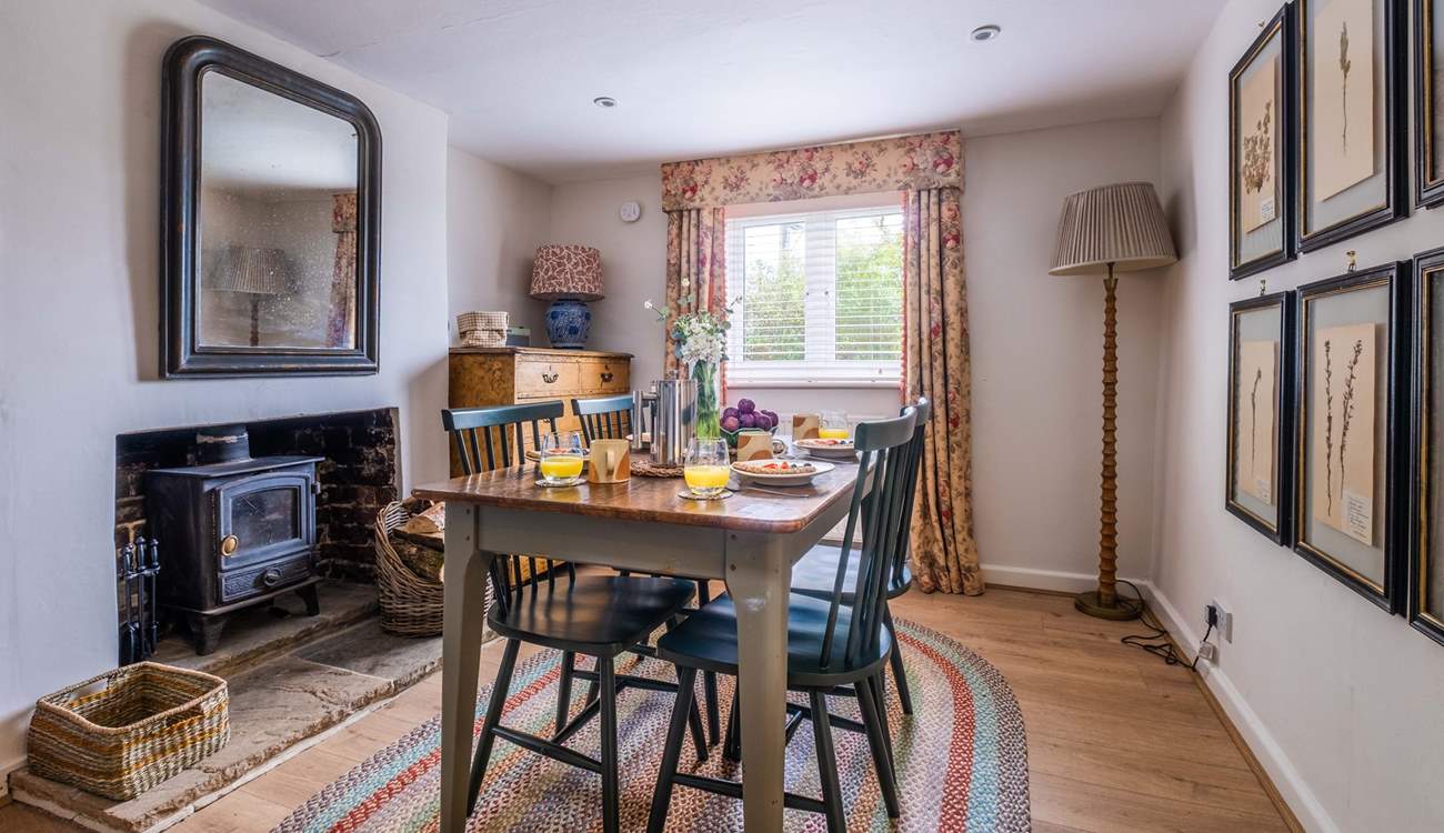 The dining-room has a wood-burner to keep you cosy in cooler months.