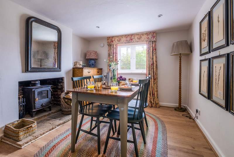 The dining-room has a wood-burner to keep you cosy in cooler months.