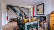 The stairs lead from the dining-room to the bedrooms on the first floor.