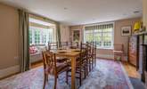 The spacious dining-room has dual aspect windows and a delightful window seat. - Thumbnail Image