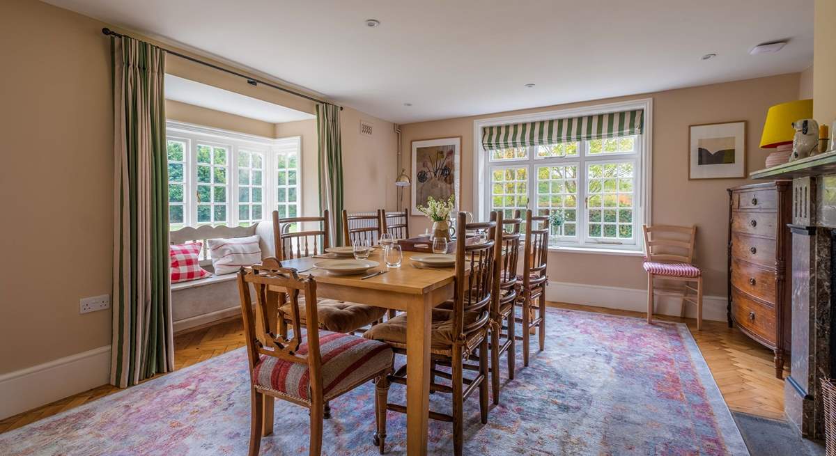 The spacious dining-room has dual aspect windows and a delightful window seat.