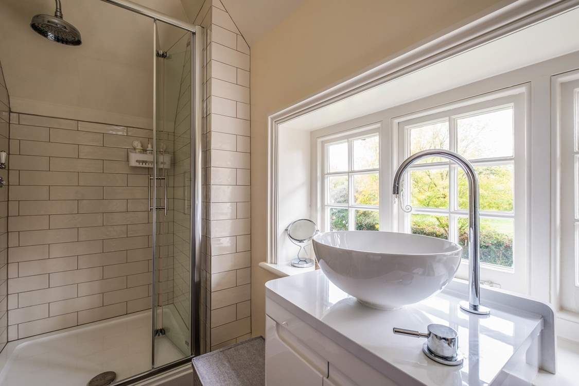 Three of the bedrooms have en suite bath/shower-rooms and the fourth bedroom has a bathroom next door.