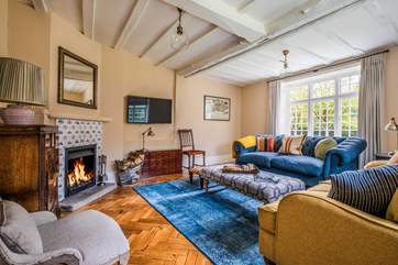This beautiful traditional cottage is complemented with gorgeous furnishings.
