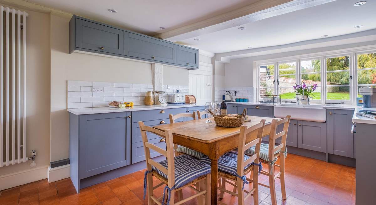 The traditional farmhouse table in the kitchen. Pull up a chair, grab a pot of tea and a slice of cake and enjoy planning holiday adventures.