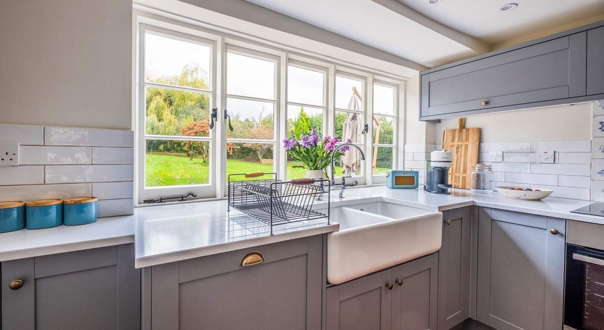 Washing up here will never be a chore with that fabulous view of the garden!