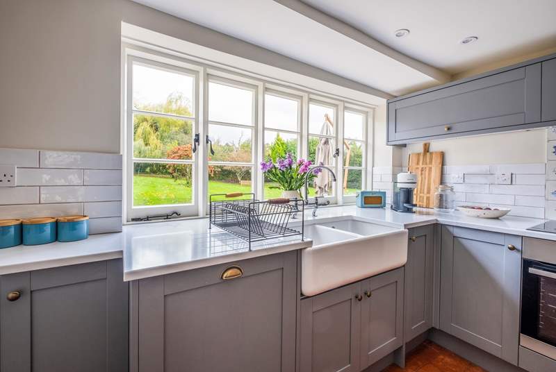 Washing up here will never be a chore with that fabulous view of the garden!